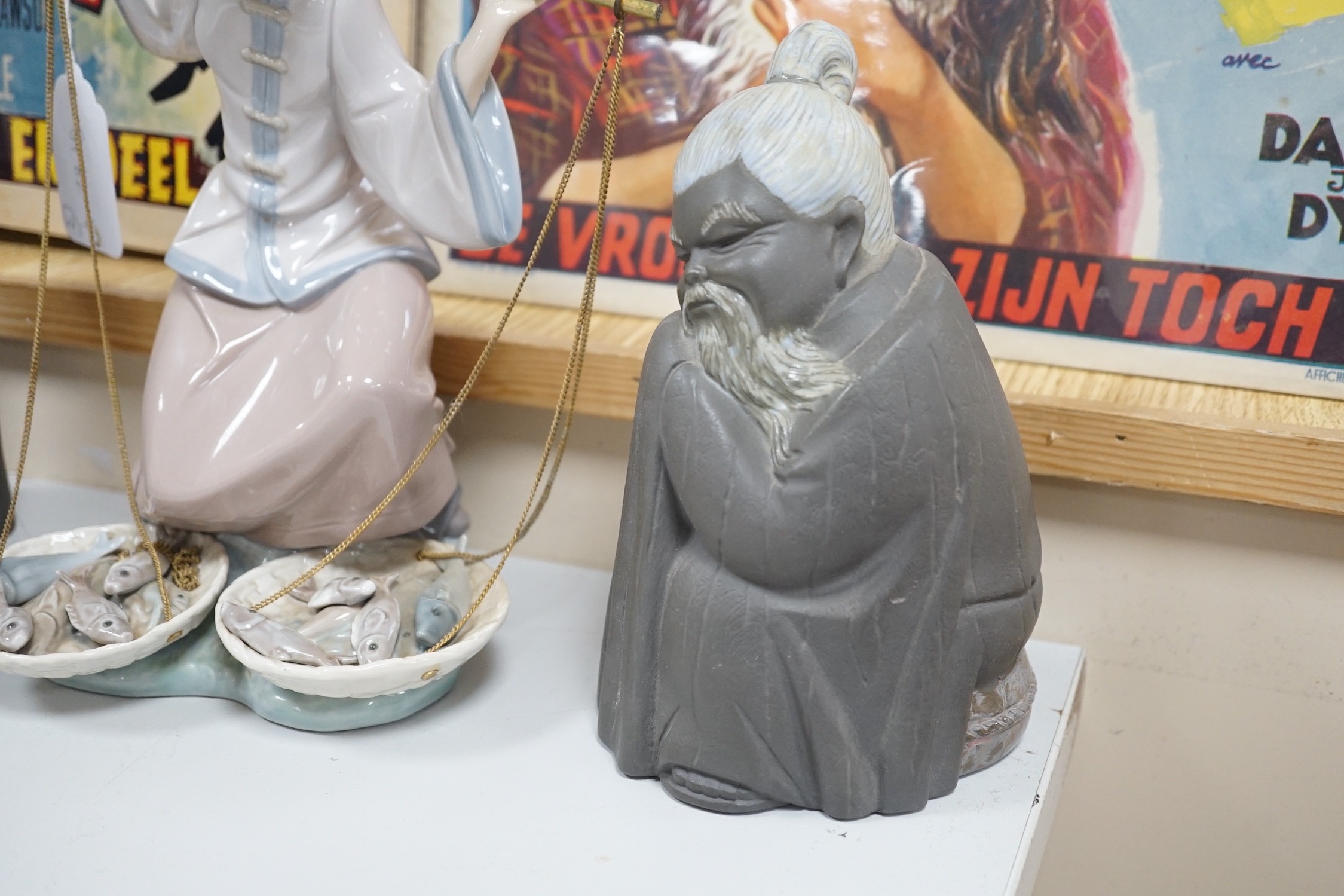 Three Lladro figures, 25cms high